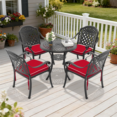 Ensemble de salle à manger d'extérieur 5 pièces, table ronde de 78 cm avec trou pour parasol et 4 chaises empilables, coussins rouges