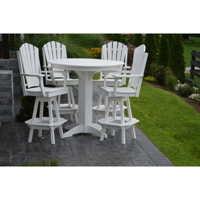 Nettie 4 - Person Patio Dining Set with Round Table
