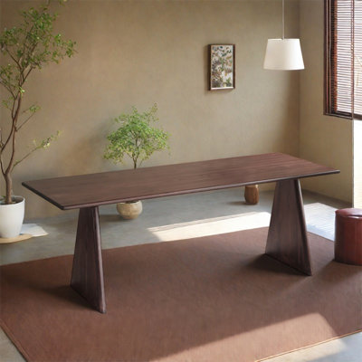A rectangular dining table made of ash wood