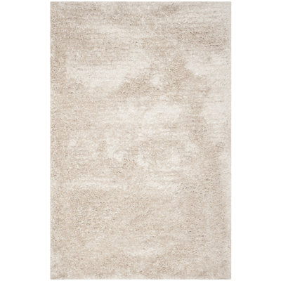 Delane Handmade Shag Champagne Area Rug