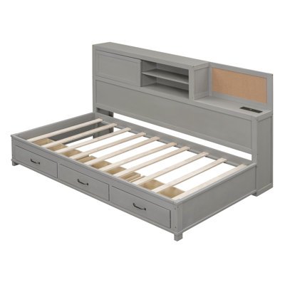 Wooden Daybed With 3 Storage Drawers, Upper Soft Board, Shelf, And A Set Of Sockets And USB Ports