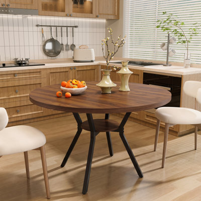 Table de salle à manger ronde de 107 cm de diamètre avec tablette de rangement et piètement en métal pour 4 personnes.