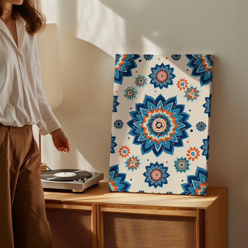 La toile crée un motif floral vibrant et complexe mettant en vedette de grands mandalas symétriques dans des tons de bleu profond, orange, art mural sur toile