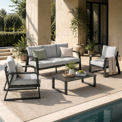 Ensemble de mobilier d'extérieur moderne en aluminium avec canapé, chaises, table basse et coussins Modern