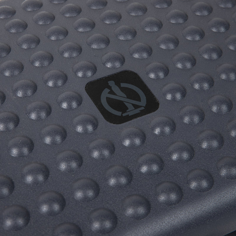 Adjustable Black Ergonomic Plastic Foot Rest with Textured Surface