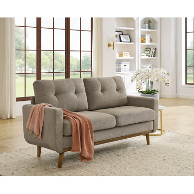 Canapé capitonné de style Mid-Century moderne avec pieds en bois, d'une largeur de 67,7 pouces pour un confort élégant et un design intemporel.