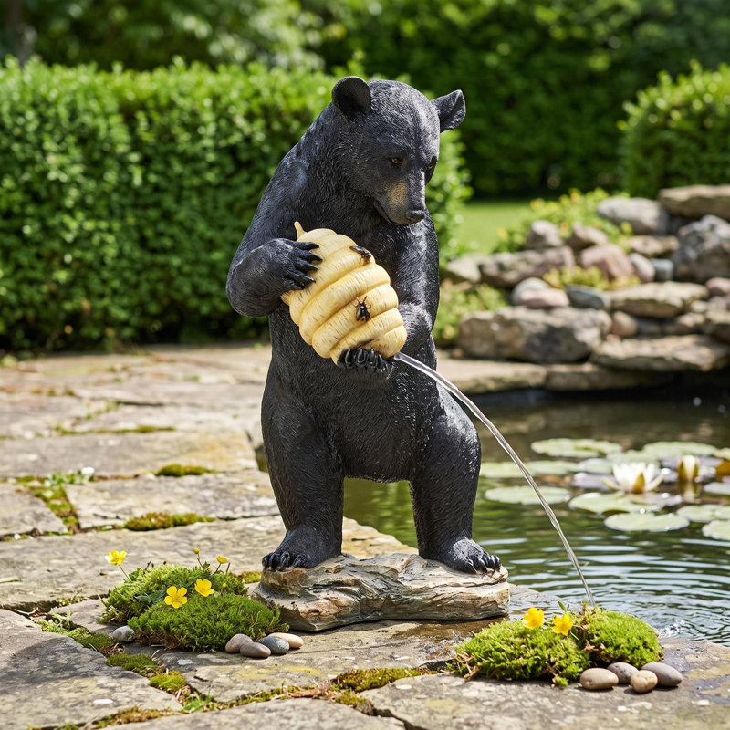 Statue de ruche et d'ours noir