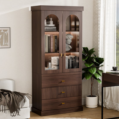 Arched Glass Display Cabinet With LED Lighting, Walnut Wood Grain, Gold Hardware, Open Shelves & Three Textured Drawers