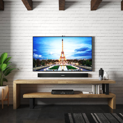 Meuble télé en bois massif pour téléviseur de 78 po ou moins Beckner