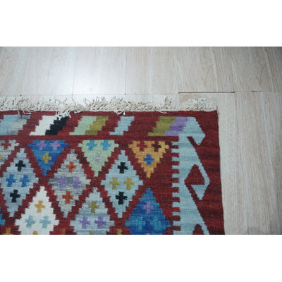 Tapis en laine tissé à plat multicolore Amara Kilim