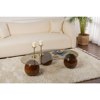 Table basse moderne Chrisina avec plateau 100% verre trempé, 47,2 po x 11,8 po x 27,6 po | Pieds coulés en polyuréthane durable, finition élégante en noyer et bronze | Parfait pour le salon et les espaces contemporains, design élégant