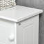 Armoire de rangement au-dessus de la toilette
