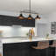 Luminaire suspendu pour îlot de cuisine 3 lumières noir / or Germanton