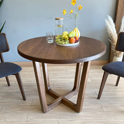 Geise Walnut Wood Round Dining Room Table, Mid Century Modern by Corrigan Studio
