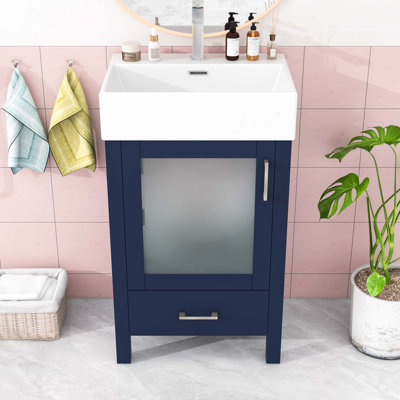 Meuble-lavabo simple moderne avec un lavabo en céramique, une porte en verre givré et beaucoup de rangement