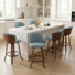 Tabouret de comptoir pivotant rembourré avec structure en bois Devault