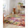 Tapis orange / rose / bleu / jaune à motif abstrait Corlenzo