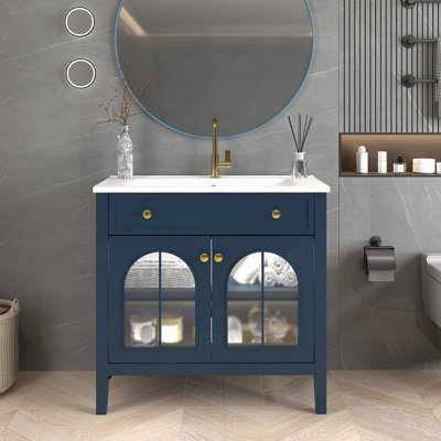 Meuble-lavabo autoportant de style Mid-Century avec capteur de mouvement, verre à motif et lavabo en céramique intégré pour les toilettes modernes.