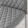 Lenworth Chrome and Glass Rectangular Dining Table Set with 4 Quilted Faux Leather Chairs
