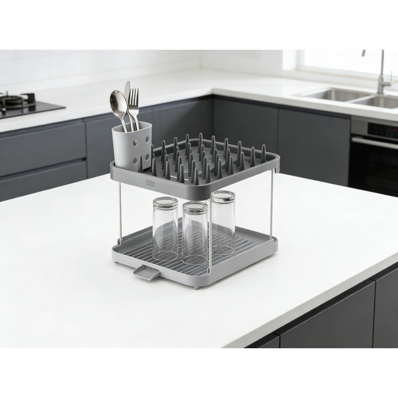 Séchoir à vaisselle extensible à 2 niveaux avec porte-ustensiles, base de drainage inclinée et pieds antidérapants pour un espace de cuisine efficace