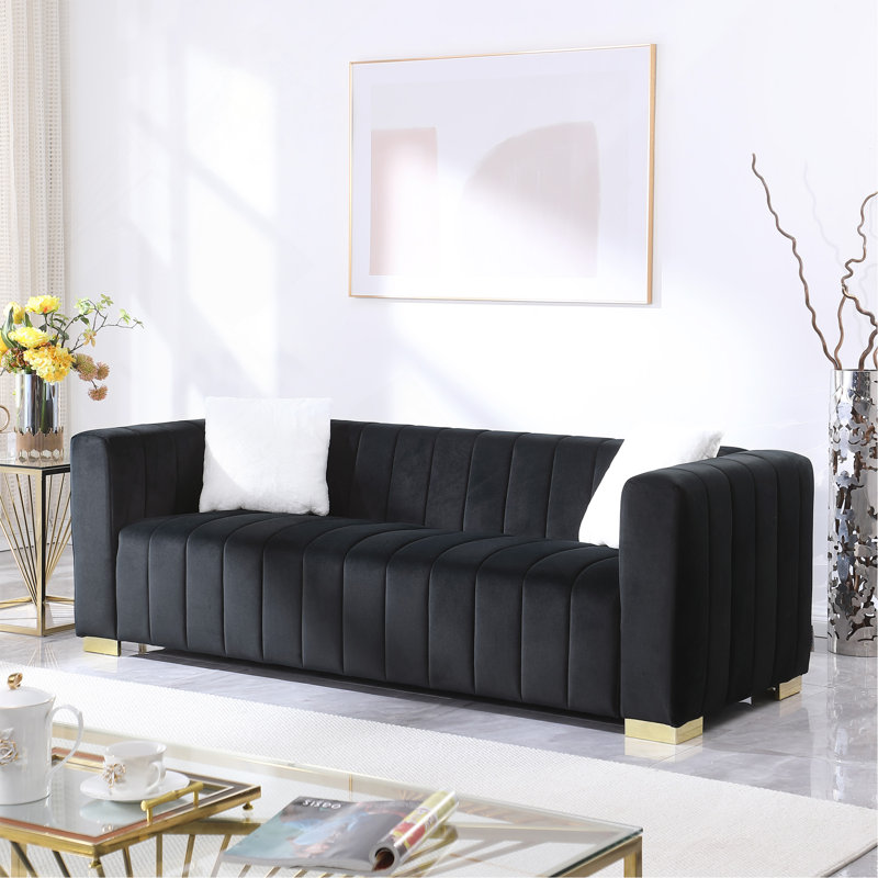 Un canapé-lit moderne sur un Chesterfield traditionnel