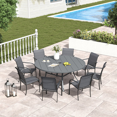 Sonji Round 8 - Person 54" Long Dining Set