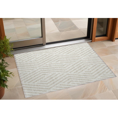 2' X 3' Beige and Ivory Geometric Washable Non Skid Indoor Outdoor Area Rug