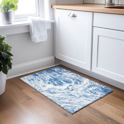 Tapis ivoire / bleu marine en polyester tissé à la machine Chayden