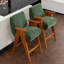 Tabouret de comptoir rembourré avec accoudoirs Kyajah-1931962081