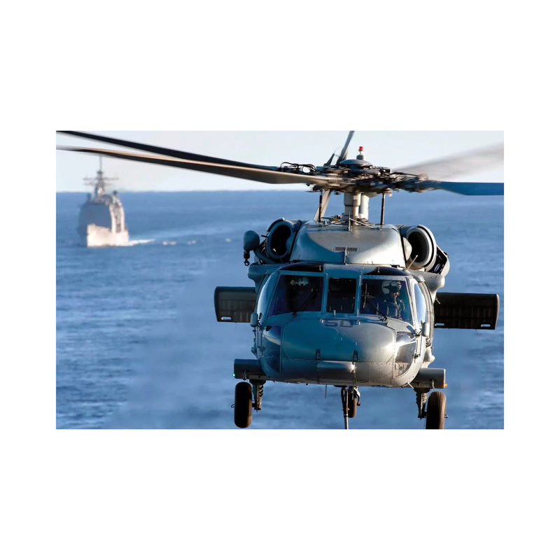 An MH-60S Seahawk Helps Conduct A Vertical Replenishment by Stocktrek Images - Wrapped Canvas Print