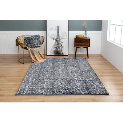 Tapis gris à imprimé animal