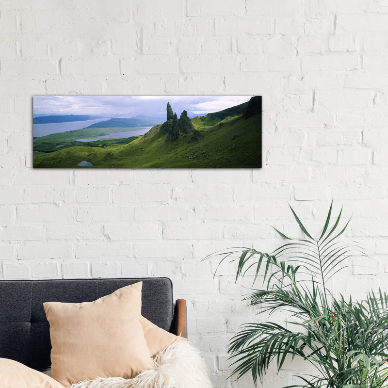 Old Man Of Storr With A High-Angle View Of Loch Leathan, Isle Of Skye, Inner Hebrides, Scotland by Panoramic Images - No Frame Panoramic Print on Canvas