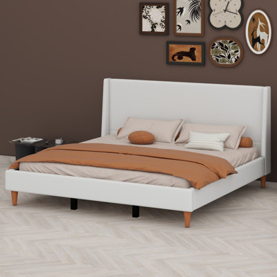 Upholstered Platform Bed With Wingback Headboard And Wooden Legs