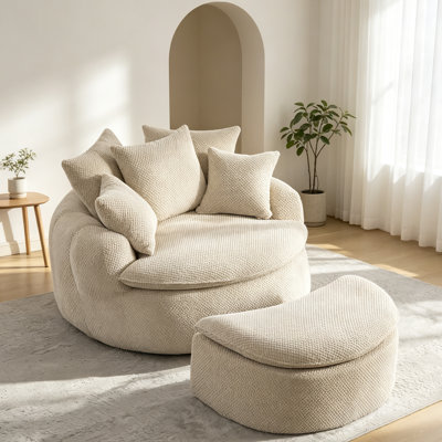 Canapé rond surdimensionné sans ossature avec pouf