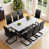 Table blanche + chaise noire est en rupture de stock