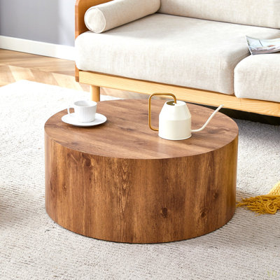 Table basse simple cylindrique, 23,6 po de diamètre x 11,8 po de hauteur, mobilier en bois aggloméré. Convient à un salon de style industriel ou minimaliste moderne.