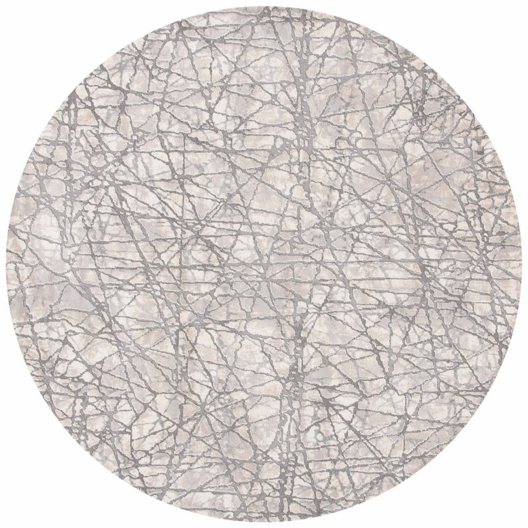 Tapis à motifs abstraits beige et gris Edvin