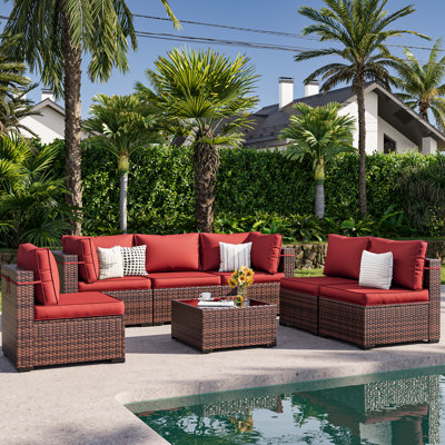 Bhairavi 7 Piece Rattan Sectional Seating Group with Cushions by Wade Logan
