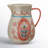  Floral Stoneware Pitcher With Handle