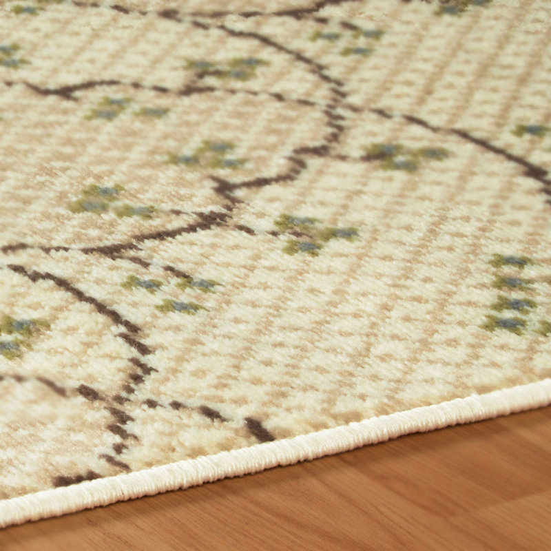 Tapis 4 pi x 6 pi beige, vert et brun à motif floral de vignes