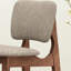 De 2 chaises modernes de style Mid-Century - Assise et dossier en tissu beige sur bois d'hévéa avec des pieds fuselés élégants et une construction robuste