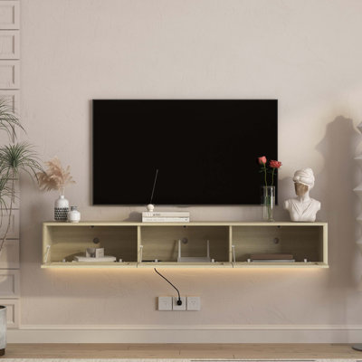 Floating Wall-Mounted TV Stand with Built-in LED Lighting, Dual USB Charging Ports, and Integrated Power Outlets for Space-Saving Entertainment Setup.
