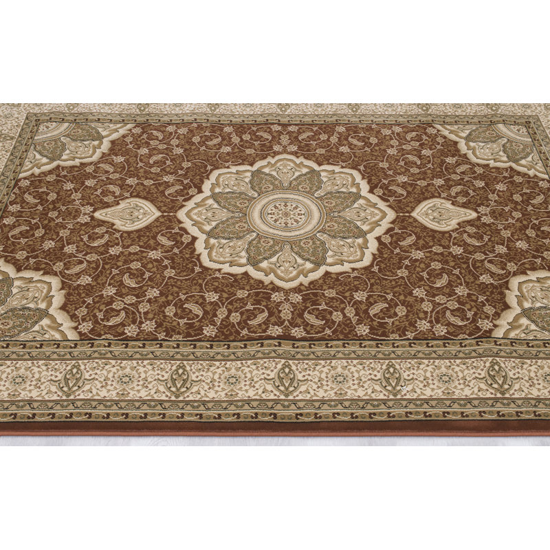 Harpersville Oriental Area Rug in Brown/Ivory
