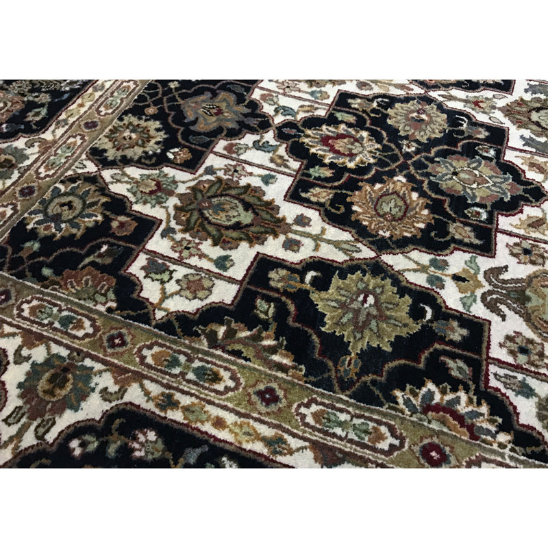 Lamani Wool Oriental Area Rug in Ivory/Black/Green