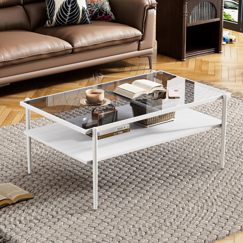 Décoration élégante pour le salon: table basse en verre trempé gris avec pieds blancs, contemporain et robuste