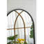 Miroir mural arqué avec motif de vitre noir et doré