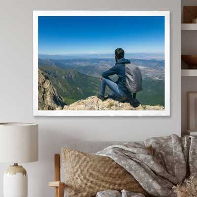 " Young Man Hiking Mountain "