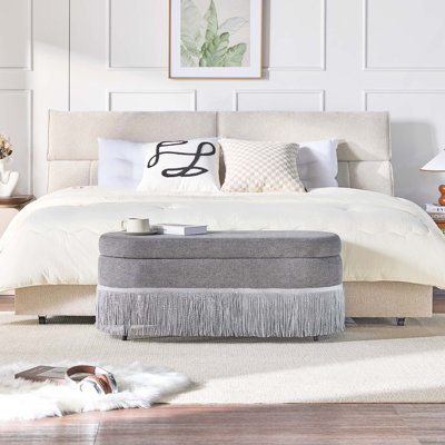 Repose-pieds ovale rembourré avec rangement à dessus relevable avec bordure à franges pour le salon ou la chambre à coucher et pieds en métal durables: le repose-pieds est doté de pieds en métal élégants et robustes qui ajoutent une touche moderne tout en assurant une stabilité et un soutien durables, parfait pour les meubles en T