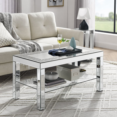 L 40 po x P 20 po x H 20 po Table basse à bordure incurvée et sculptée