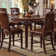 Winfred Extendable Counter Height Table in Cherry
